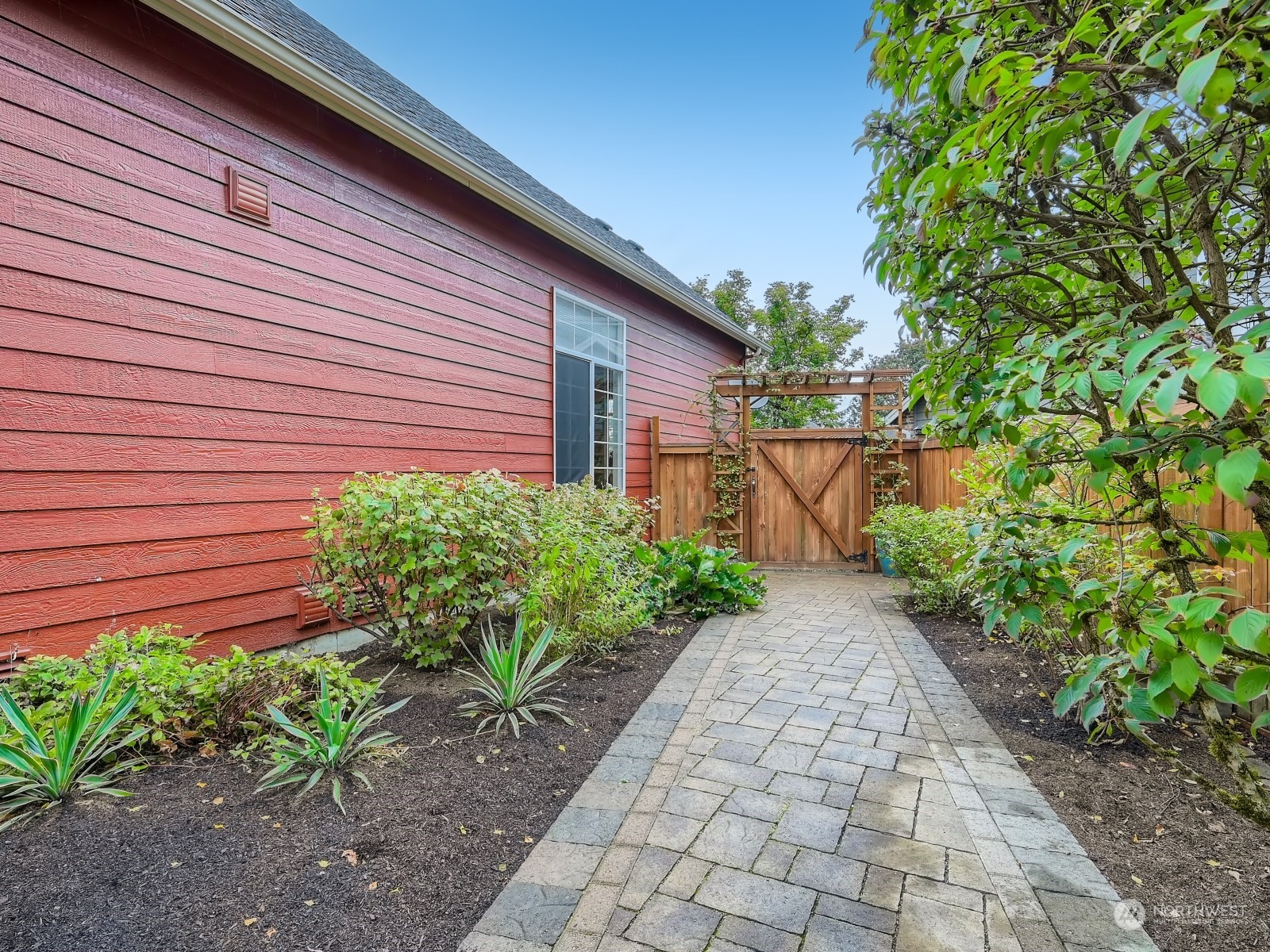 11216 39th Drive Southeast Everett, WA 98208 - Photo 35 of 40 a view of a pathway with a house