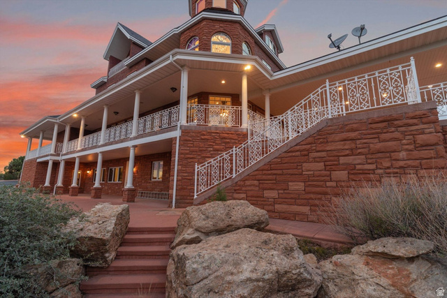 5615 East Eight Mile Gap Road Kanab, UT 84741 - Photo 72 of 81 Rear view of property with stairway