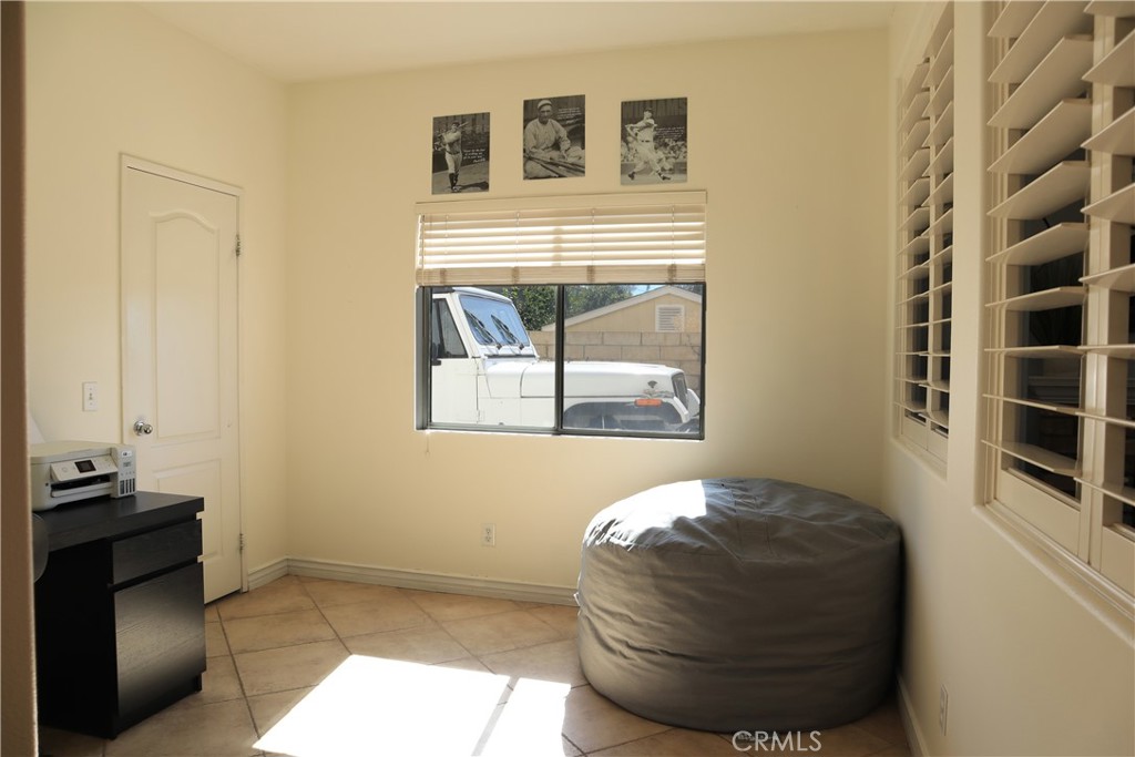 28469 Via Joyce Drive Saugus, CA 91350 - Photo 17 of 23 a bedroom with a bed and a window