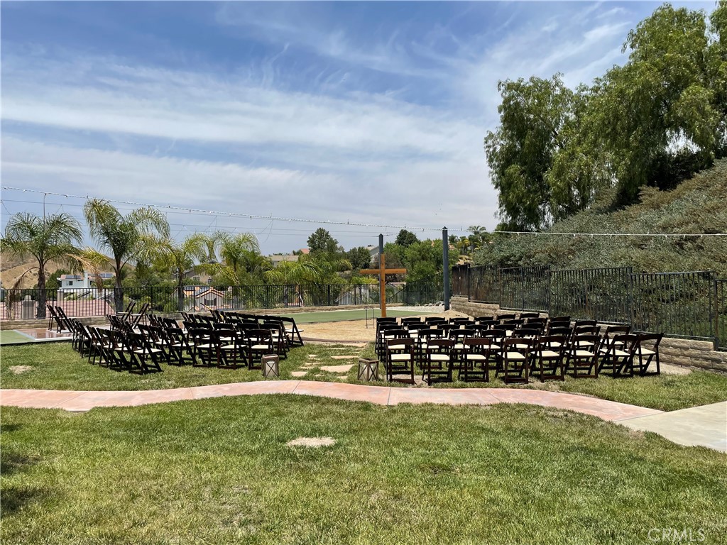 28469 Via Joyce Drive Saugus, CA 91350 - Photo 4 of 23 a view of a bench in front of a big yard