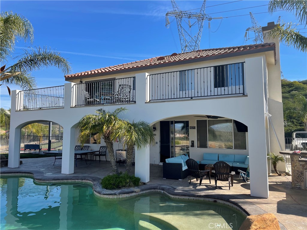 28469 Via Joyce Drive Saugus, CA 91350 - Photo 6 of 23 a view of a house with swimming pool in front of it
