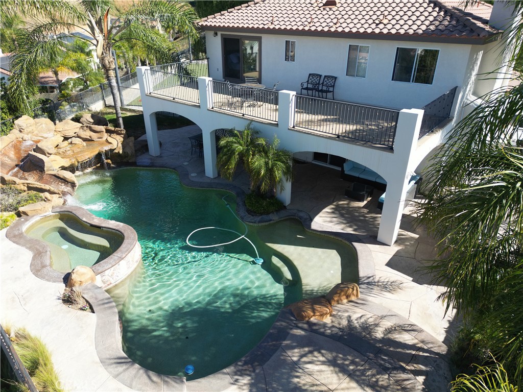 28469 Via Joyce Drive Saugus, CA 91350 - Photo 8 of 23 a view of house with backyard outdoor seating and green space