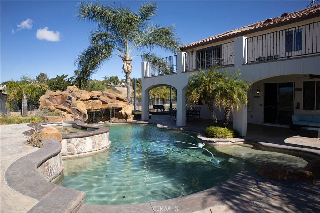 28469 Via Joyce Drive Saugus, CA 91350 - Photo 9 of 23 a swimming pool with outdoor seating