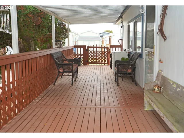 a view of balcony with furniture