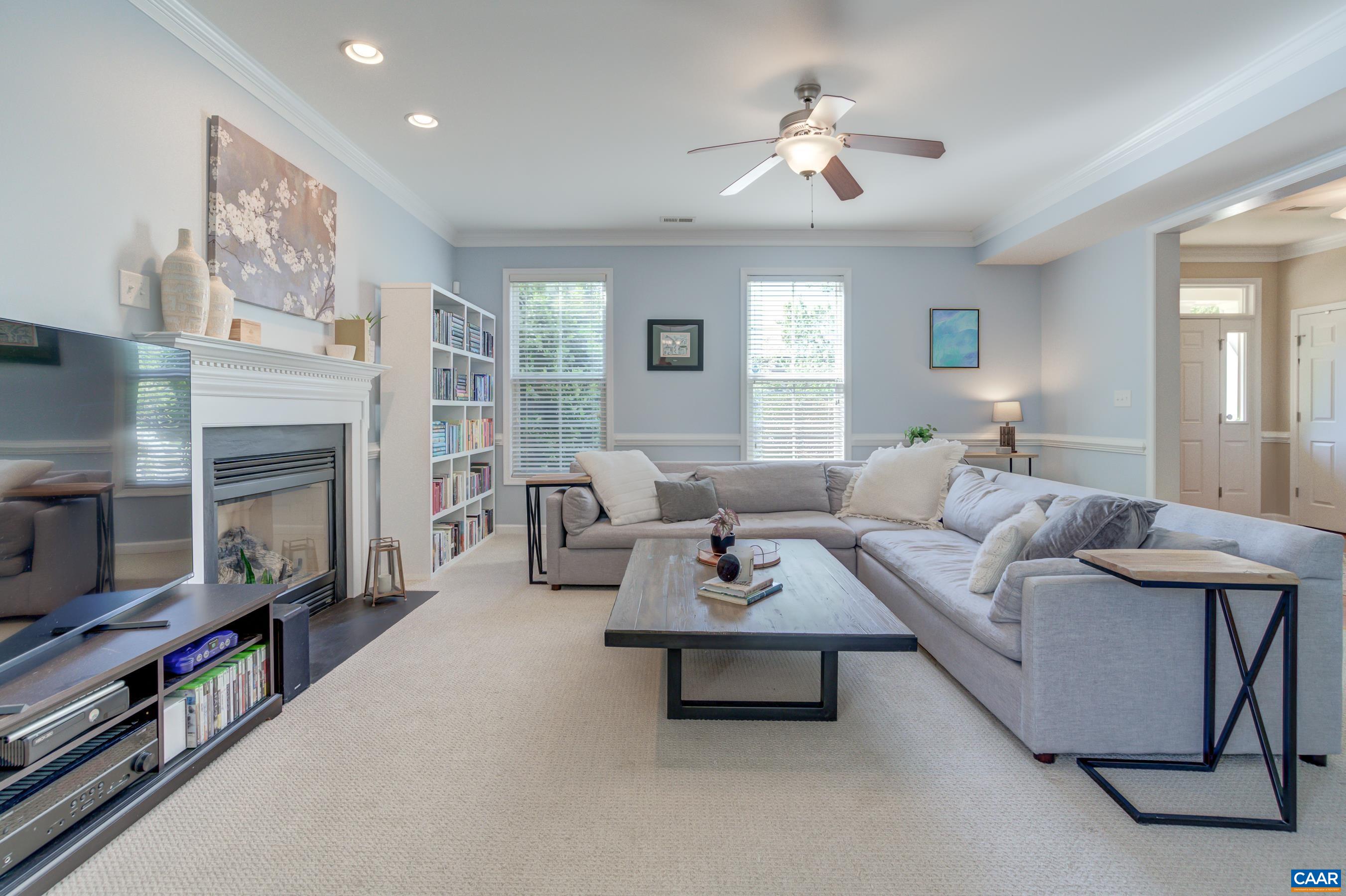 5448 Park Road Crozet, VA 22932 - Photo 12 of 28 a living room with furniture fireplace and a window