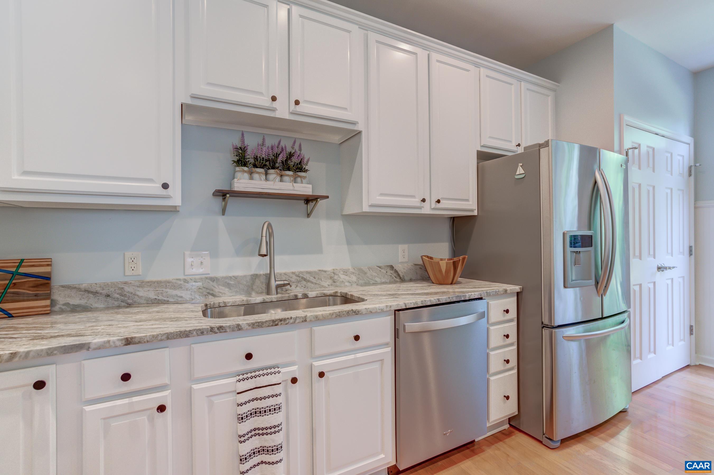 5448 Park Road Crozet, VA 22932 - Photo 17 of 28 a kitchen with stainless steel appliances granite countertop a refrigerator sink and cabinets