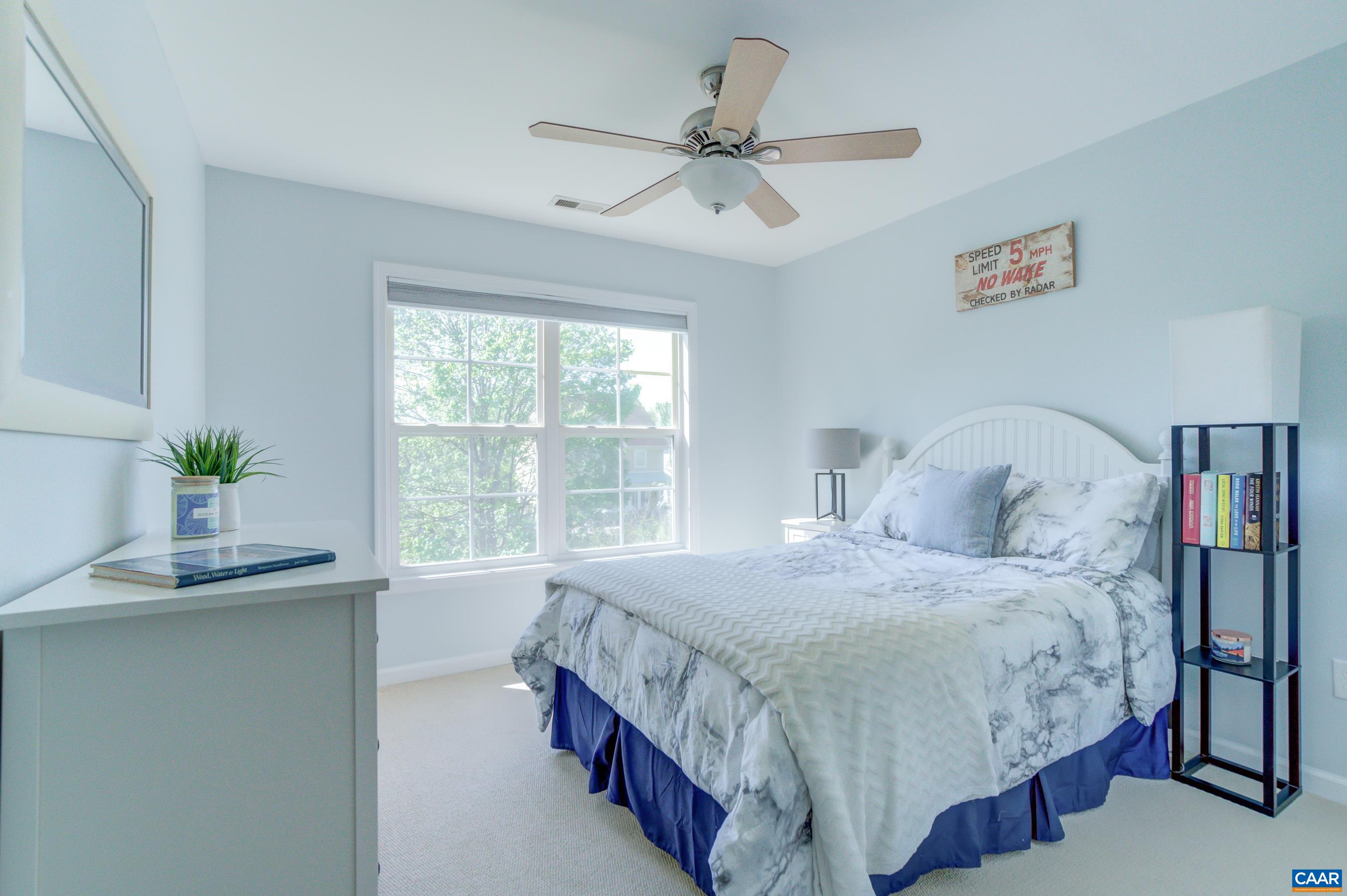5448 Park Road Crozet, VA 22932 - Photo 26 of 28 a bedroom with a large bed and a window