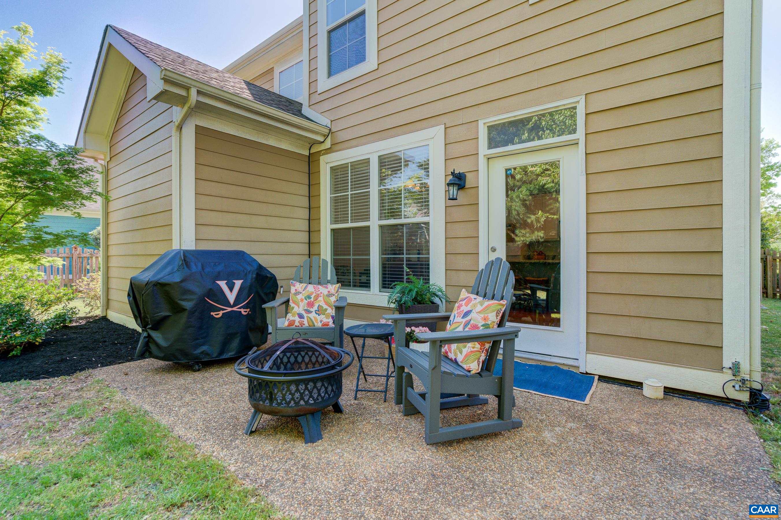 5448 Park Road Crozet, VA 22932 - Photo 6 of 28 a backyard of a house with fire pit and furniture