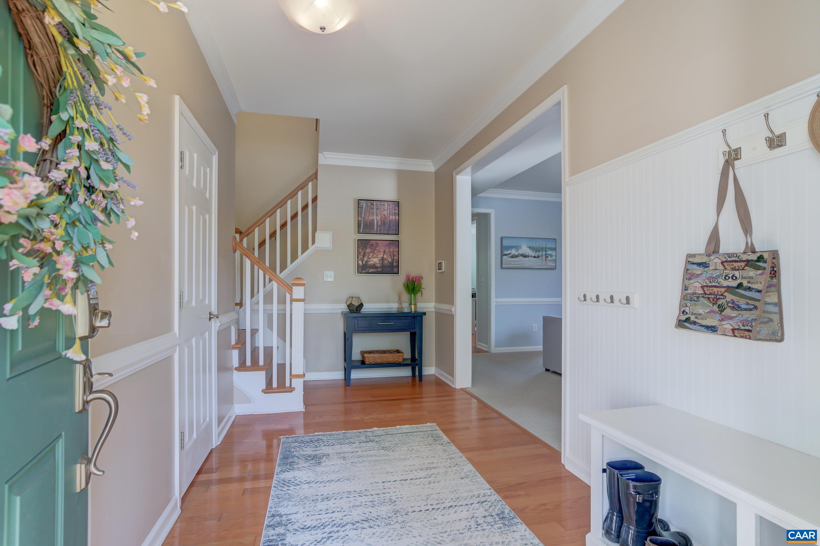 5448 Park Road Crozet, VA 22932 - Photo 9 of 28 a hallway with wooden floor and stairs
