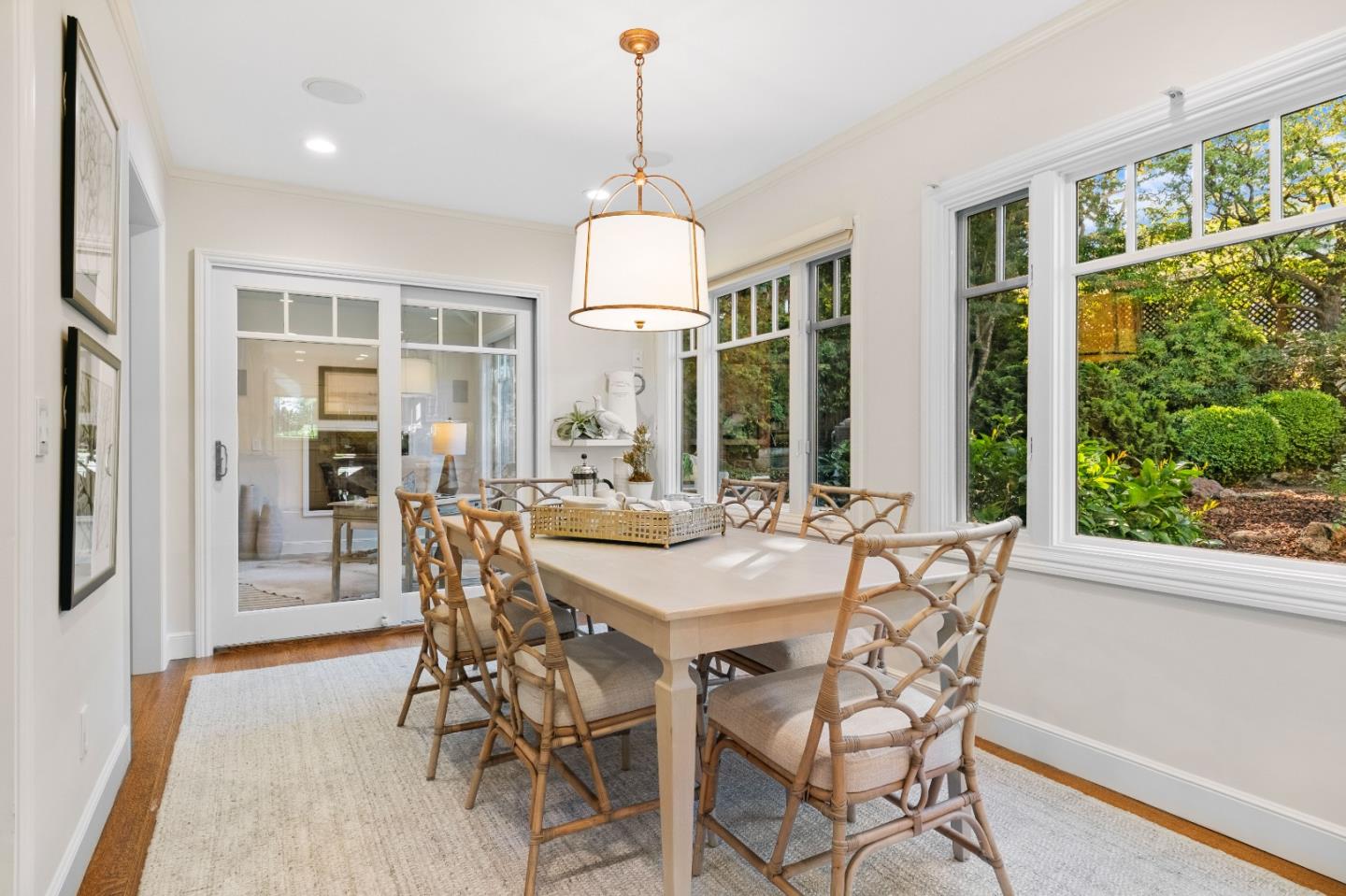 425 Dorchester Road San Mateo, CA 94402 - Photo 13 of 61 a view of a dining room with furniture large windows and wooden floor