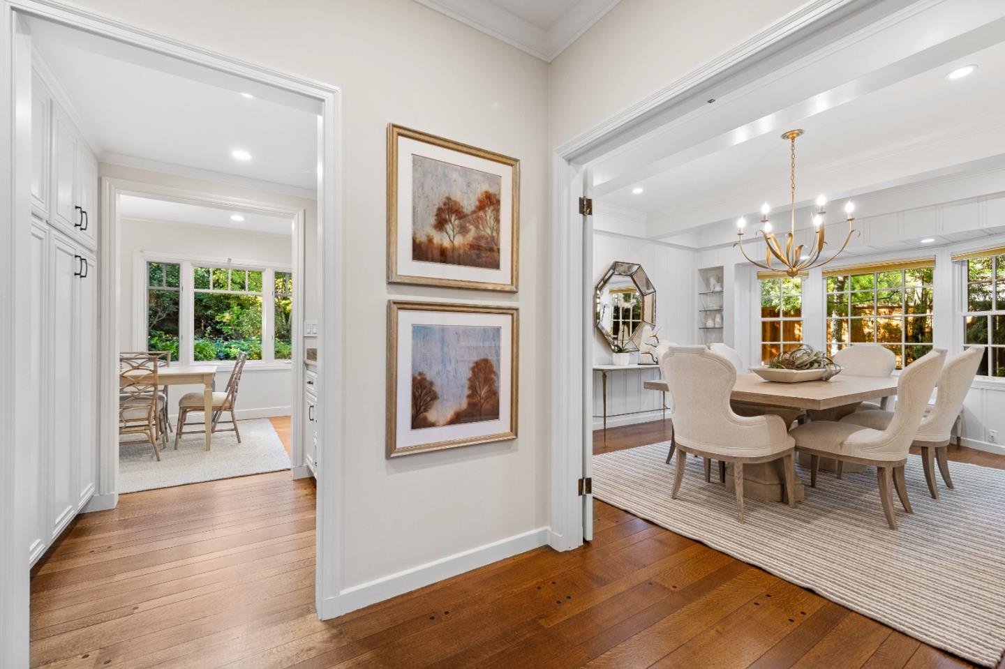 425 Dorchester Road San Mateo, CA 94402 - Photo 21 of 61 a view of a dining room with furniture a chandelier and wooden floor