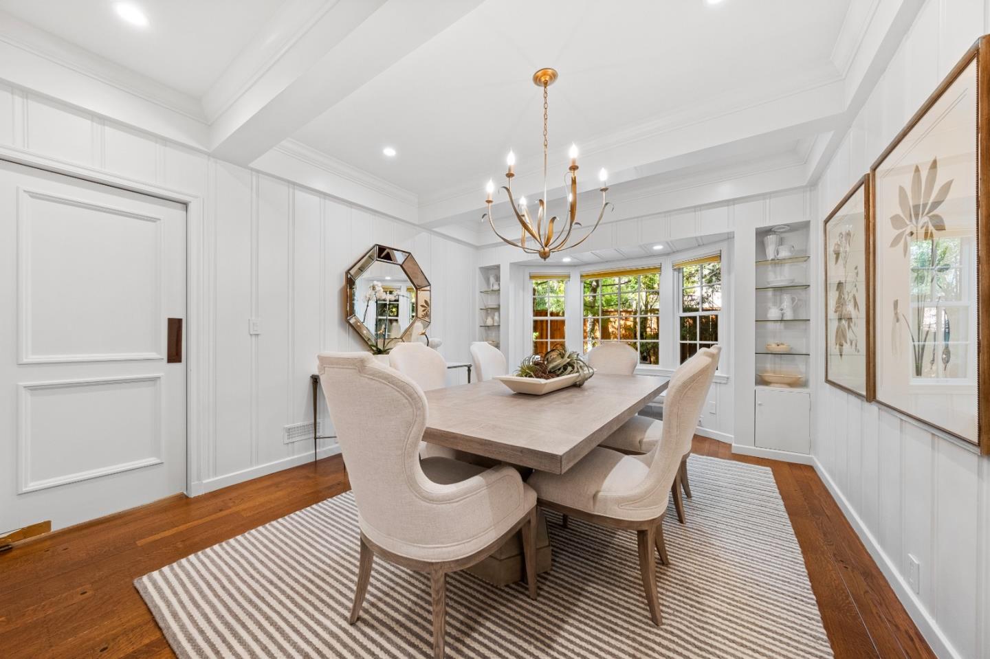 425 Dorchester Road San Mateo, CA 94402 - Photo 22 of 61 a view of a dining room with furniture a rug and wooden floor