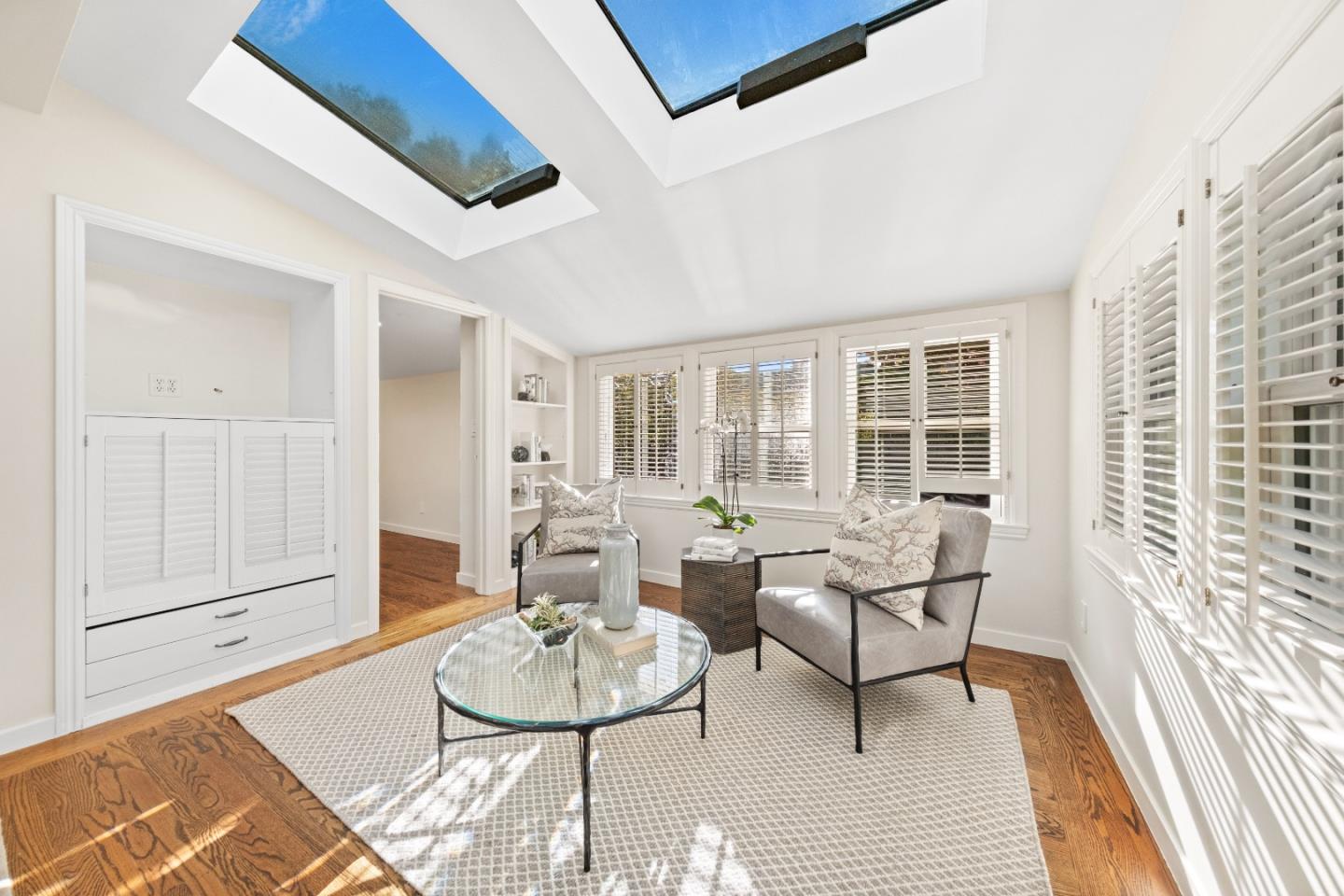 425 Dorchester Road San Mateo, CA 94402 - Photo 29 of 61 a living room with furniture and wooden floor