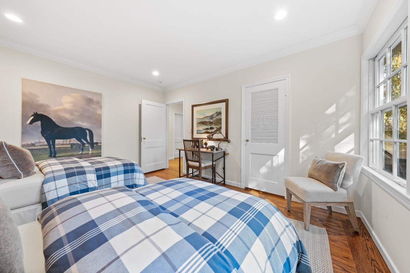 425 Dorchester Road San Mateo, CA 94402 - Photo 35 of 61 a bedroom with a bed and a chair