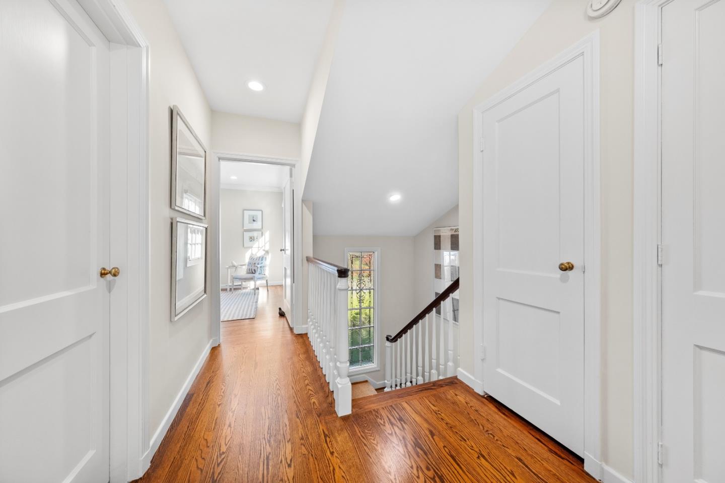 425 Dorchester Road San Mateo, CA 94402 - Photo 36 of 61 a view of a hallway view with wooden floor and staircase