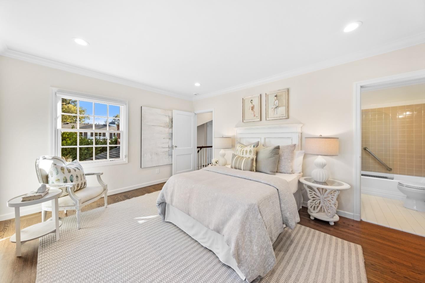 425 Dorchester Road San Mateo, CA 94402 - Photo 37 of 61 a spacious bedroom with a large bed and a window