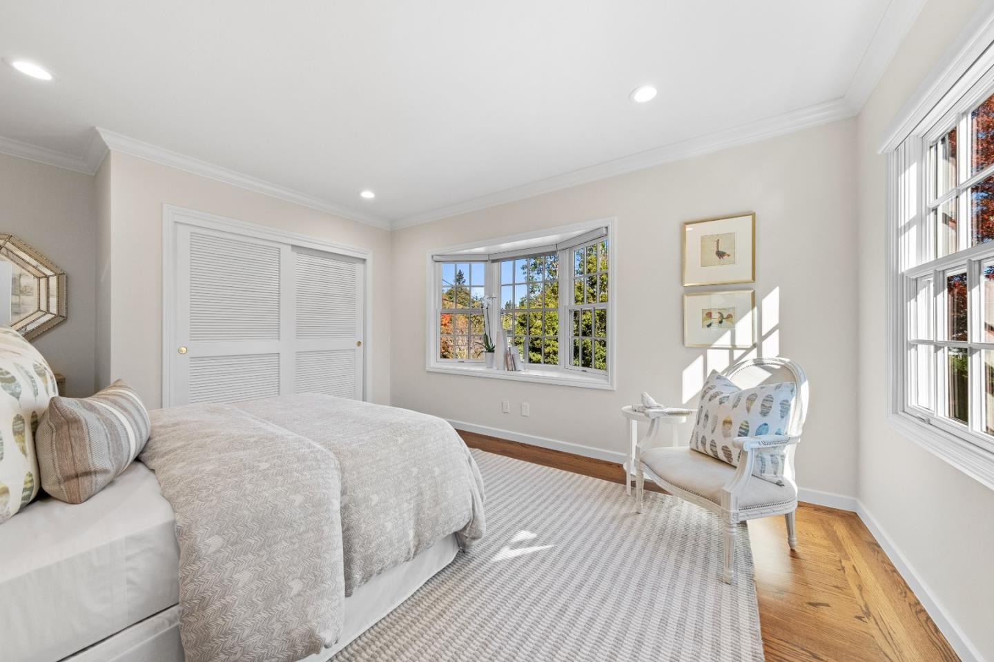 425 Dorchester Road San Mateo, CA 94402 - Photo 38 of 61 a bedroom with a large bed and a window