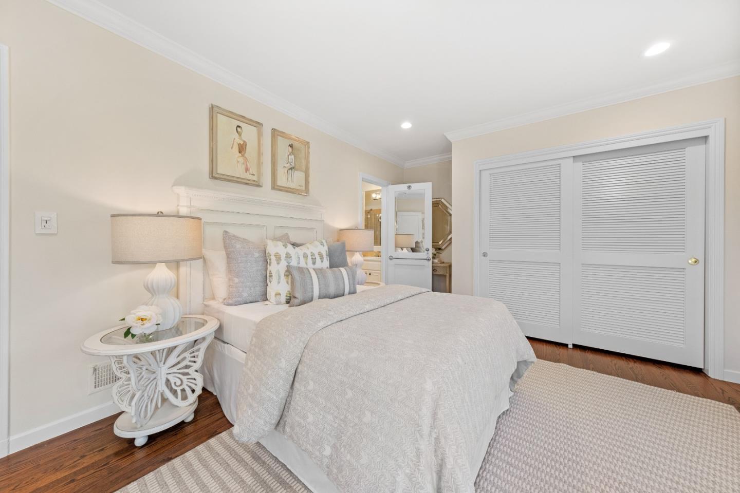 425 Dorchester Road San Mateo, CA 94402 - Photo 39 of 61 a bedroom with a bed and a table