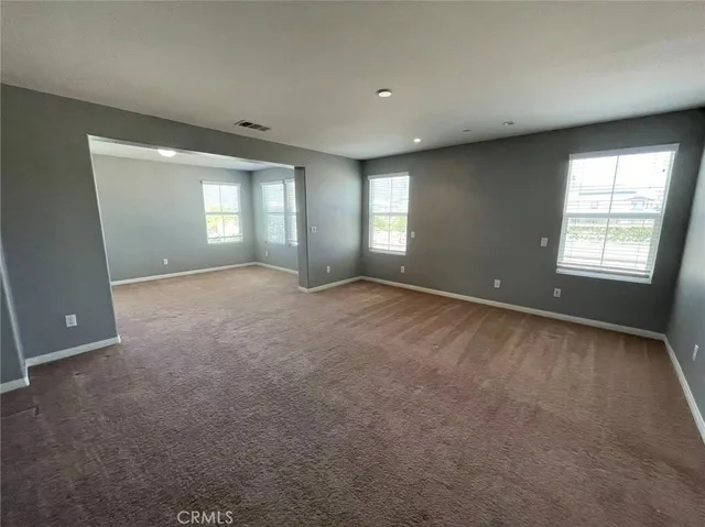 a view of a livingroom and a window