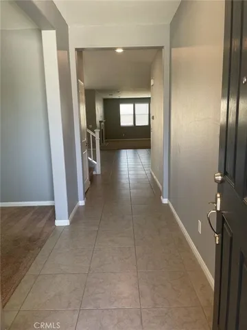 a view of hallway with livingroom