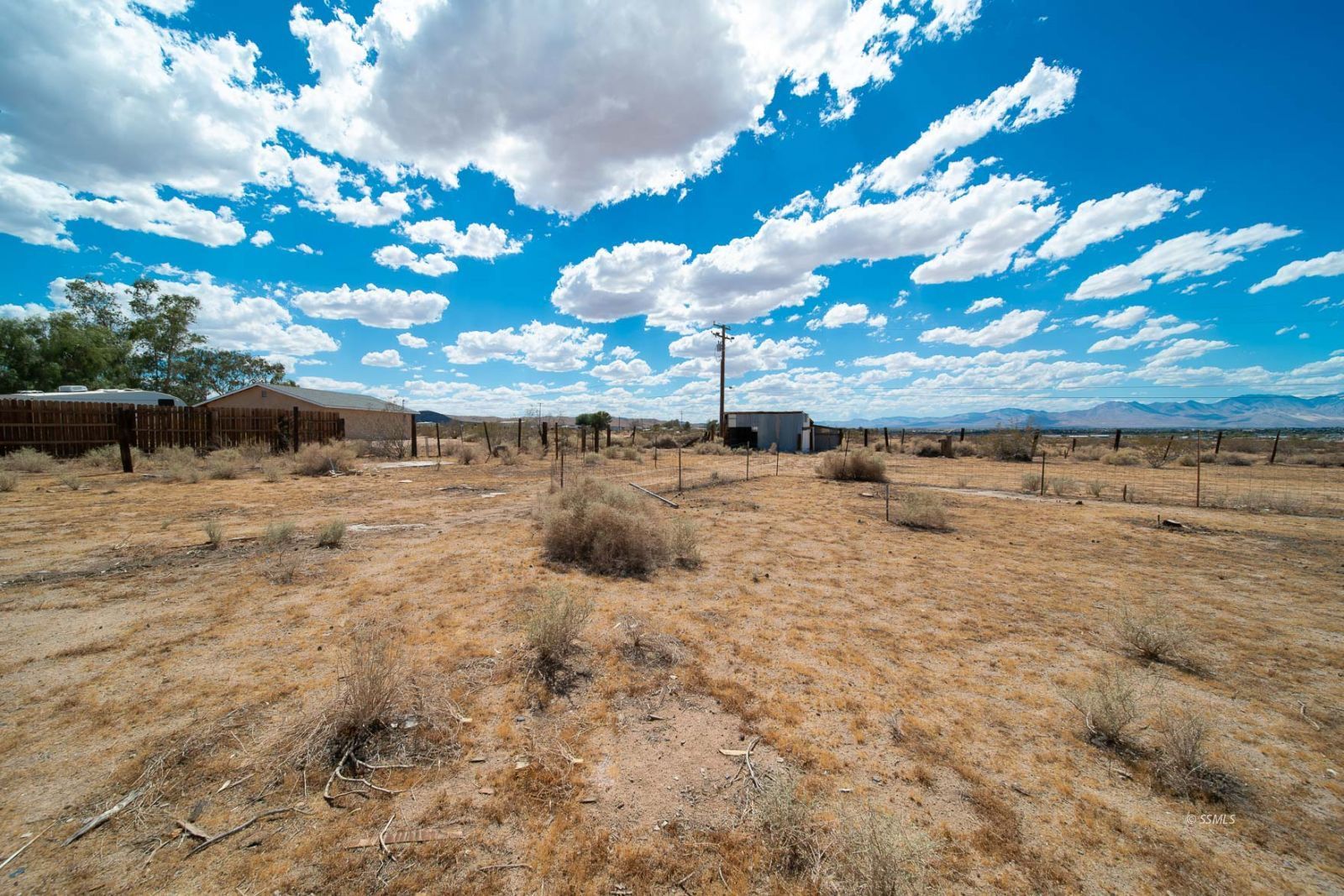 817 South Lamb Road Ridgecrest, CA 93555 - Photo 36 of 39 a view of a houses with a yard