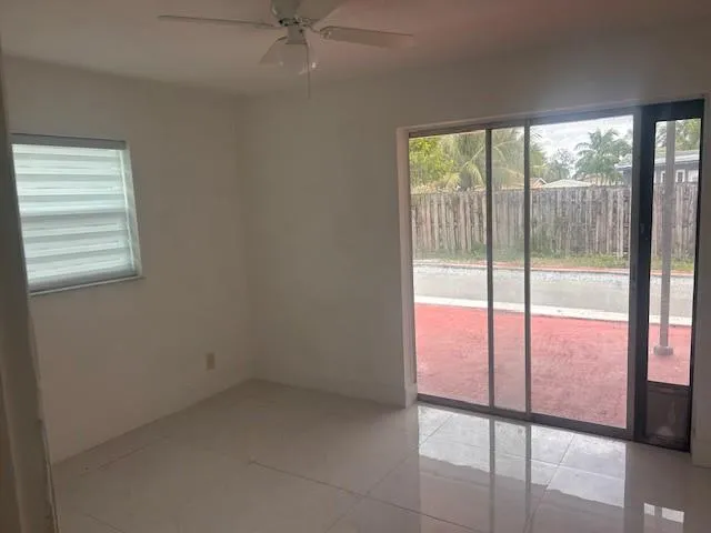 a view of an empty room and window