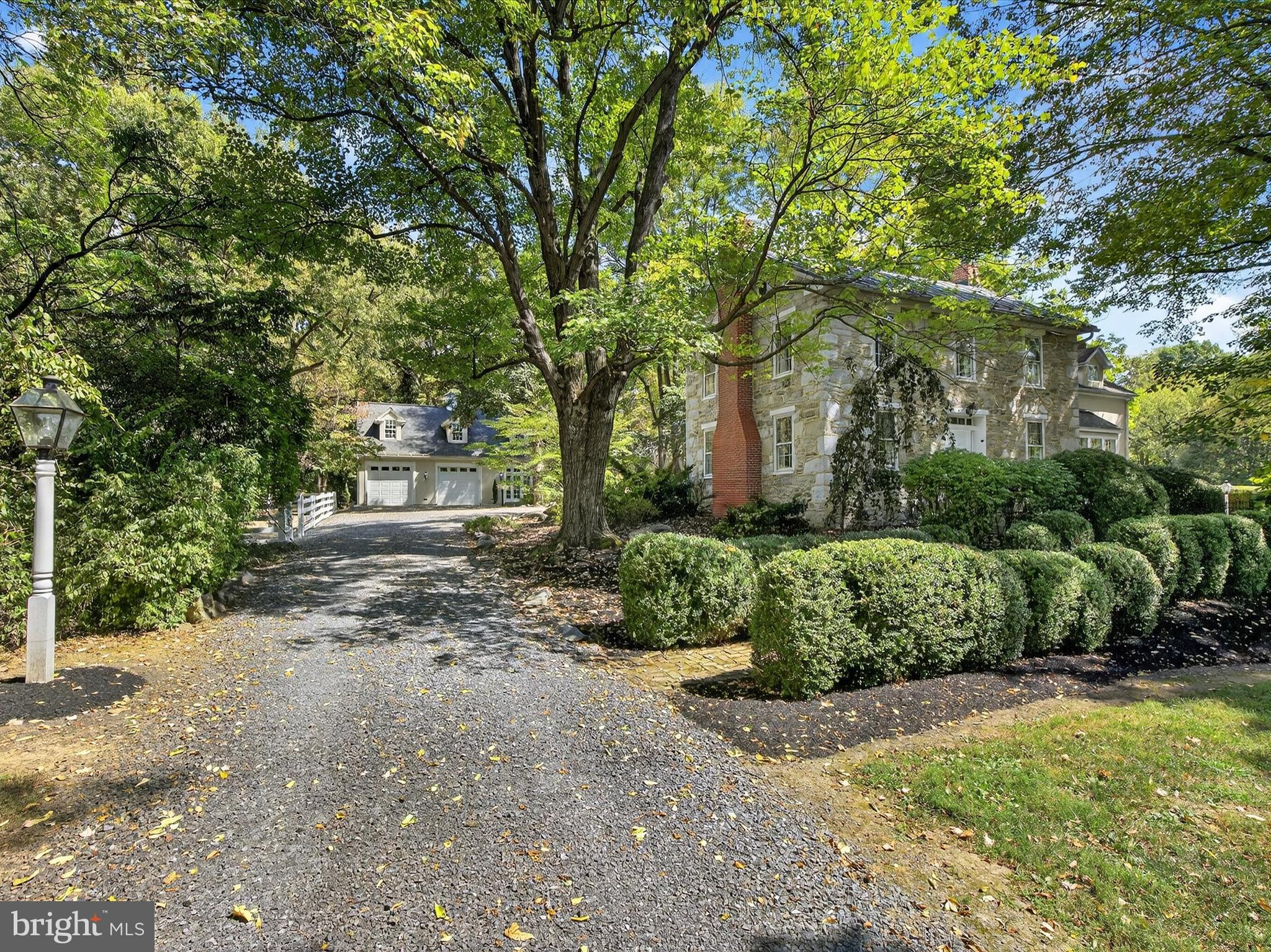 265 North Old Stonehouse Road South Carlisle, PA 17015 - Photo 11 of 100 a view of a yard with plants and large trees