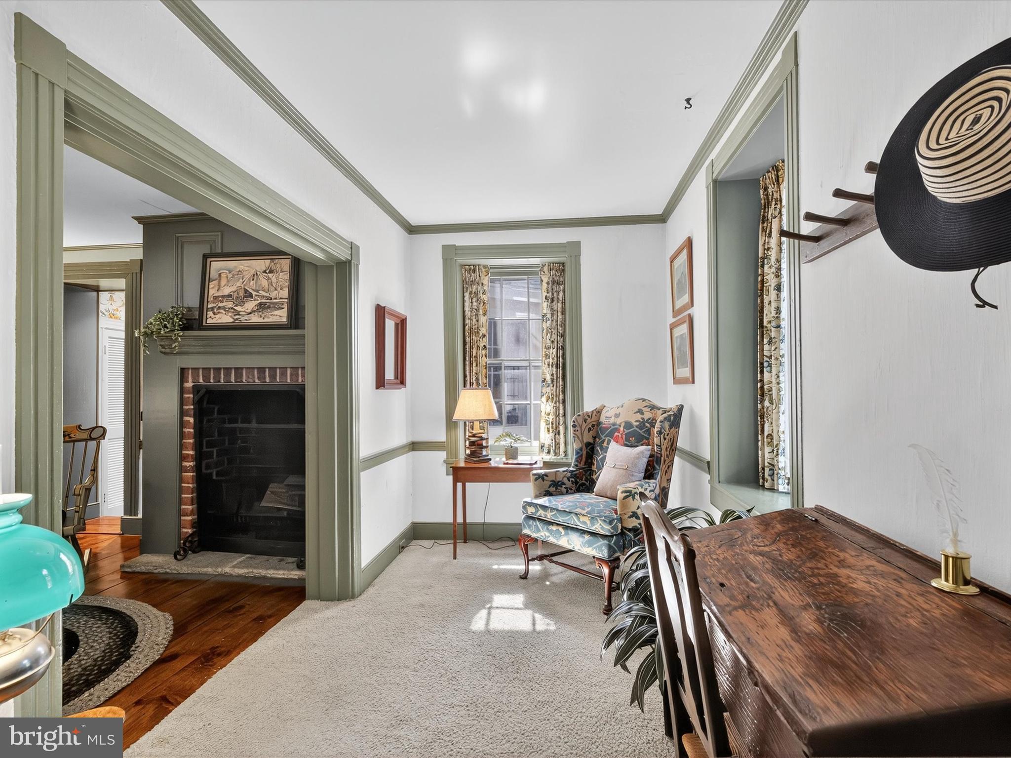 265 North Old Stonehouse Road South Carlisle, PA 17015 - Photo 23 of 100 a living room with furniture and a fireplace