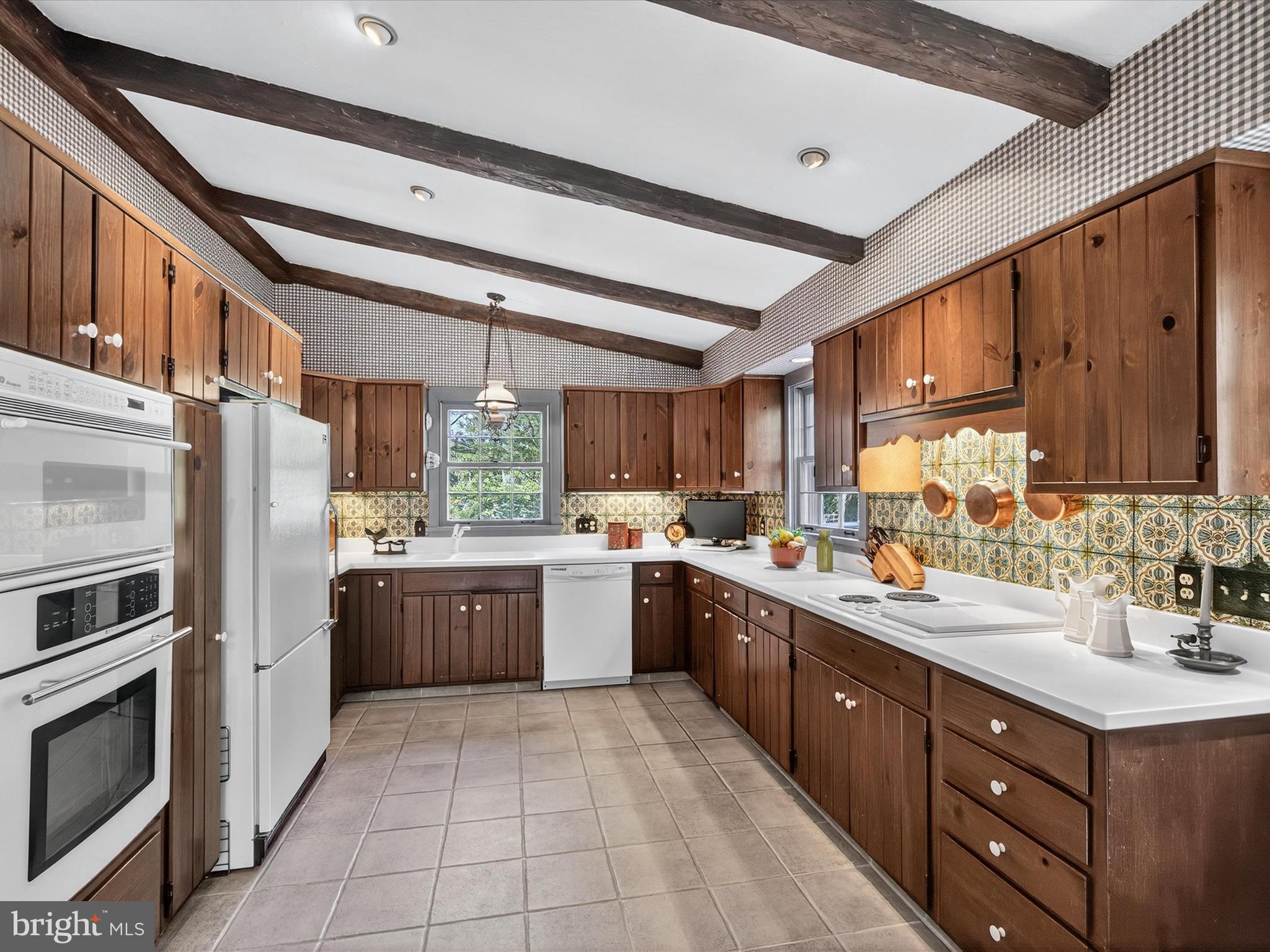 265 North Old Stonehouse Road South Carlisle, PA 17015 - Photo 6 of 100 a kitchen with stainless steel appliances granite countertop a sink counter space cabinets and a large window