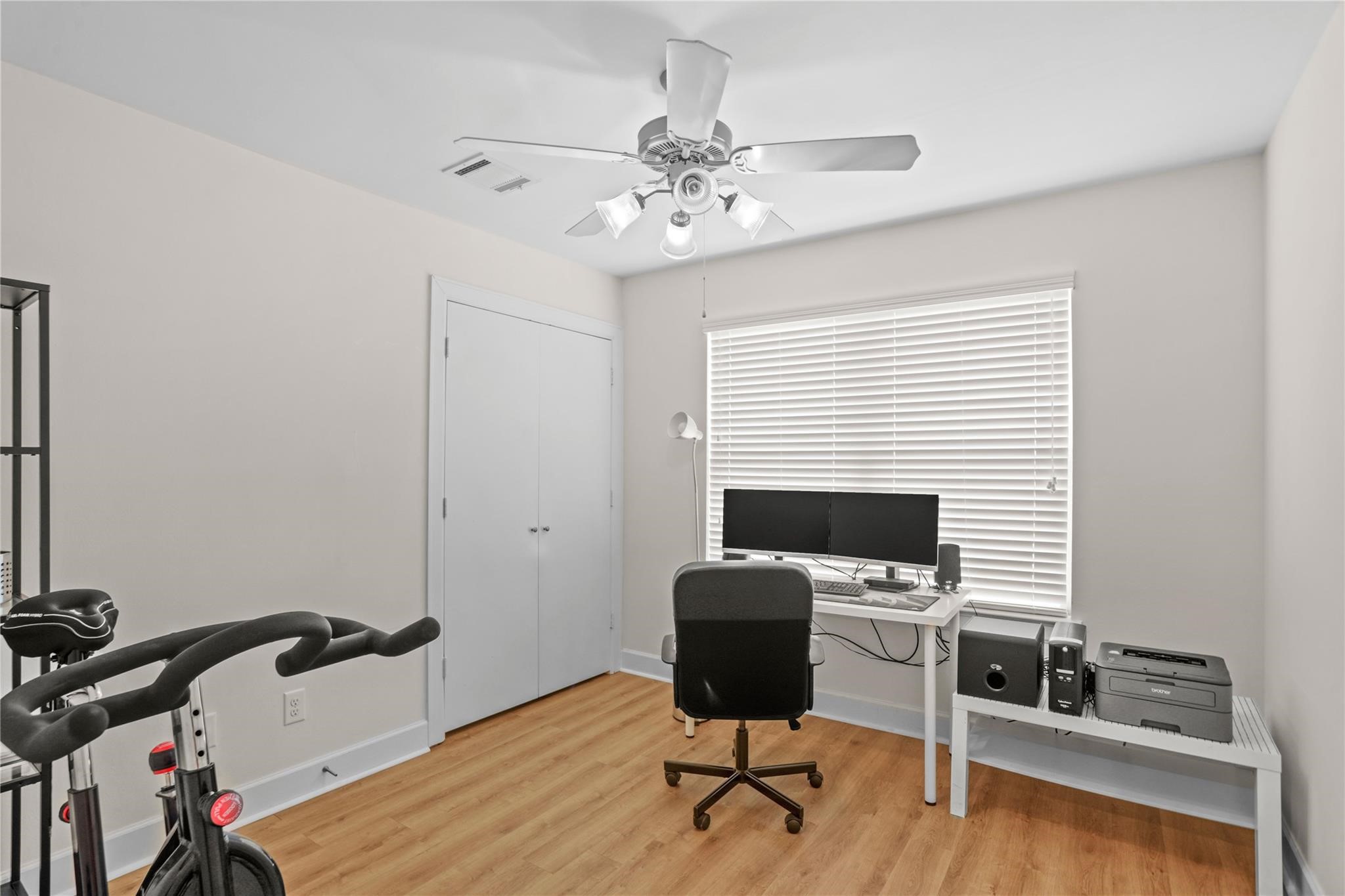 2710 Hullsmith Drive, Unit 604 Houston, TX 77063 - Photo 20 of 27 a view of a workspace with furniture and a bathroom