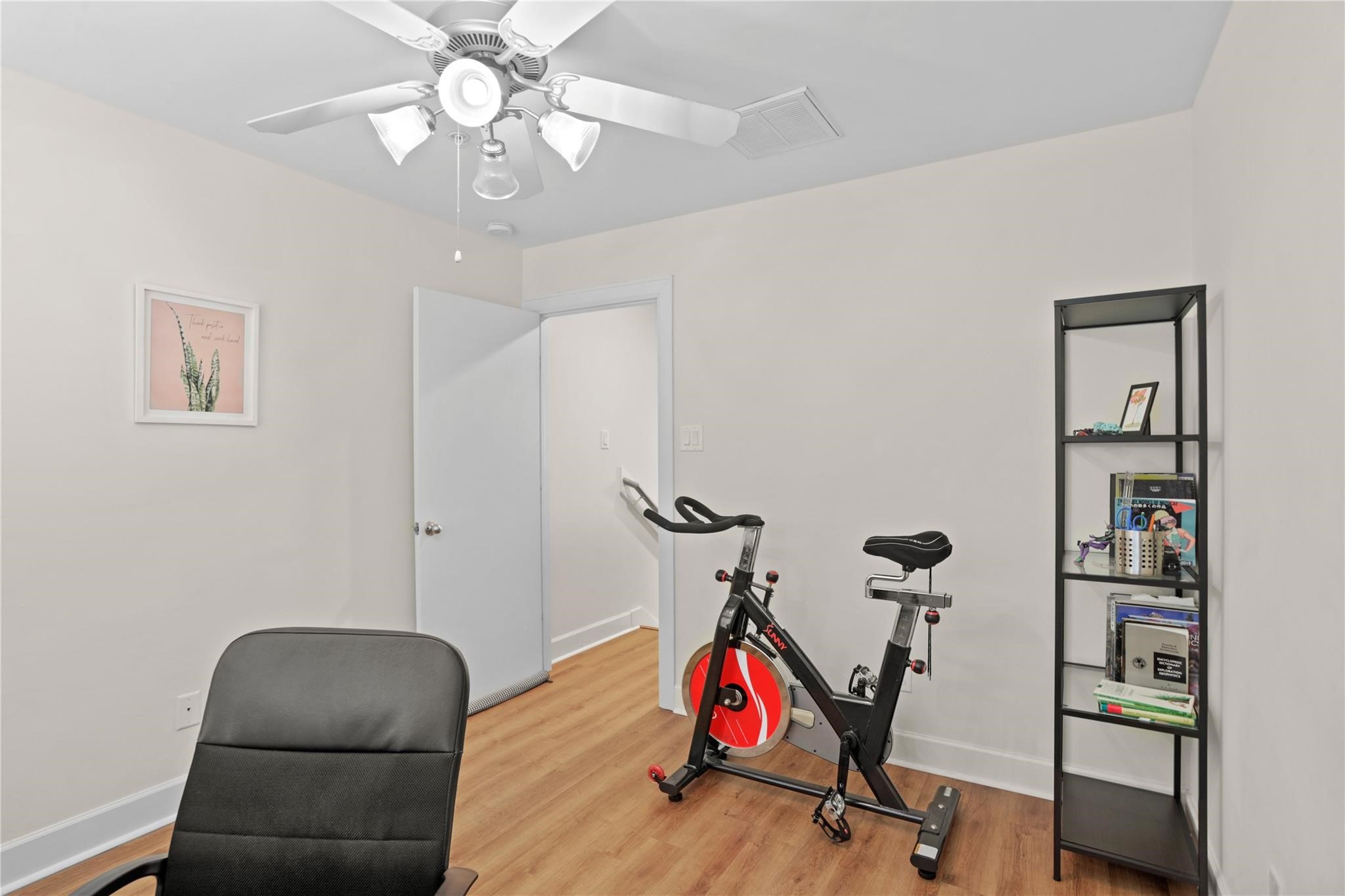 2710 Hullsmith Drive, Unit 604 Houston, TX 77063 - Photo 21 of 27 a view of a room with gym equipment