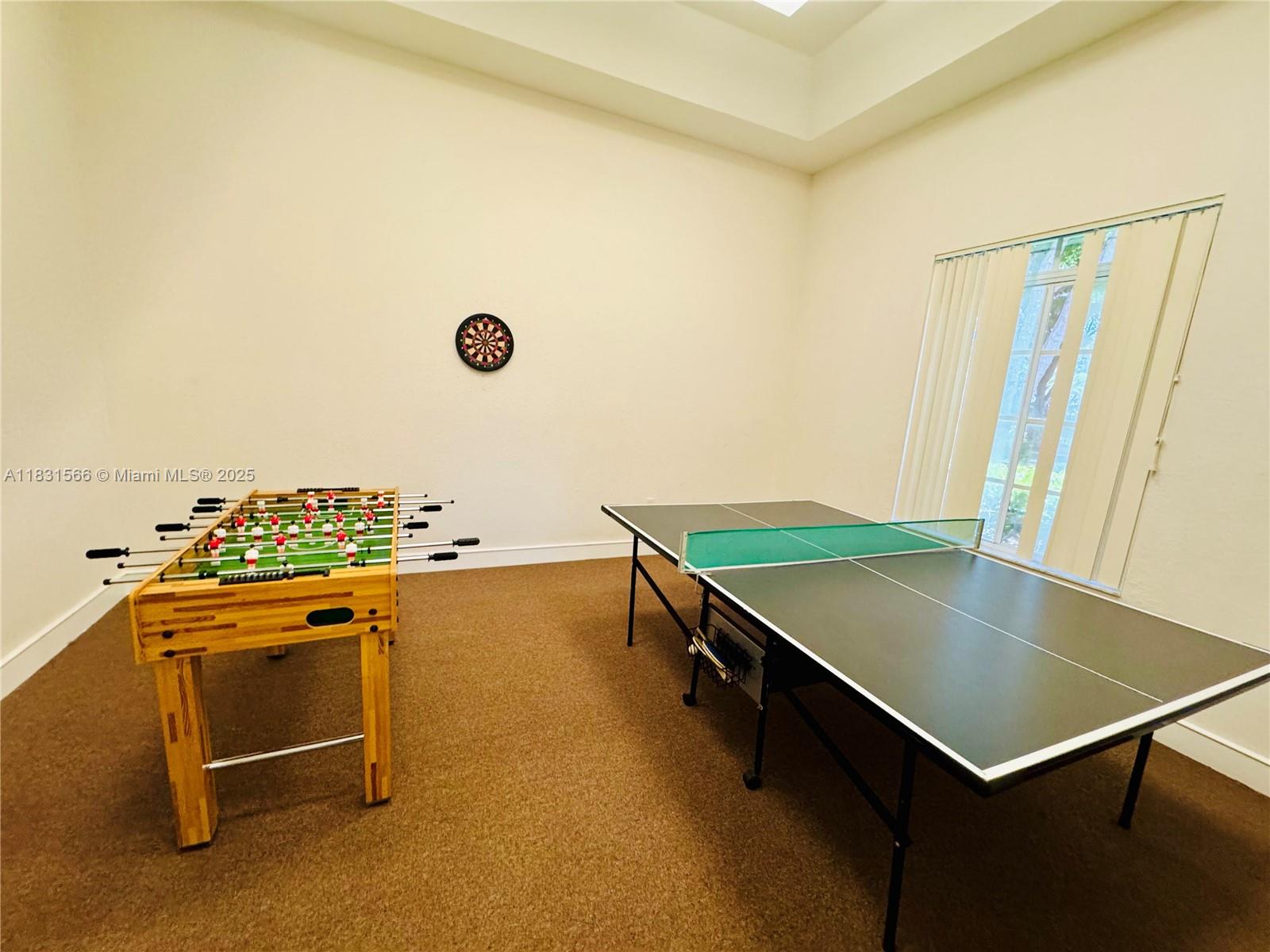 8244 Key Royal Circle, Unit 633 Naples, FL 34119 - Photo 27 of 37 a kitchen with a stove a sink and a refrigerator