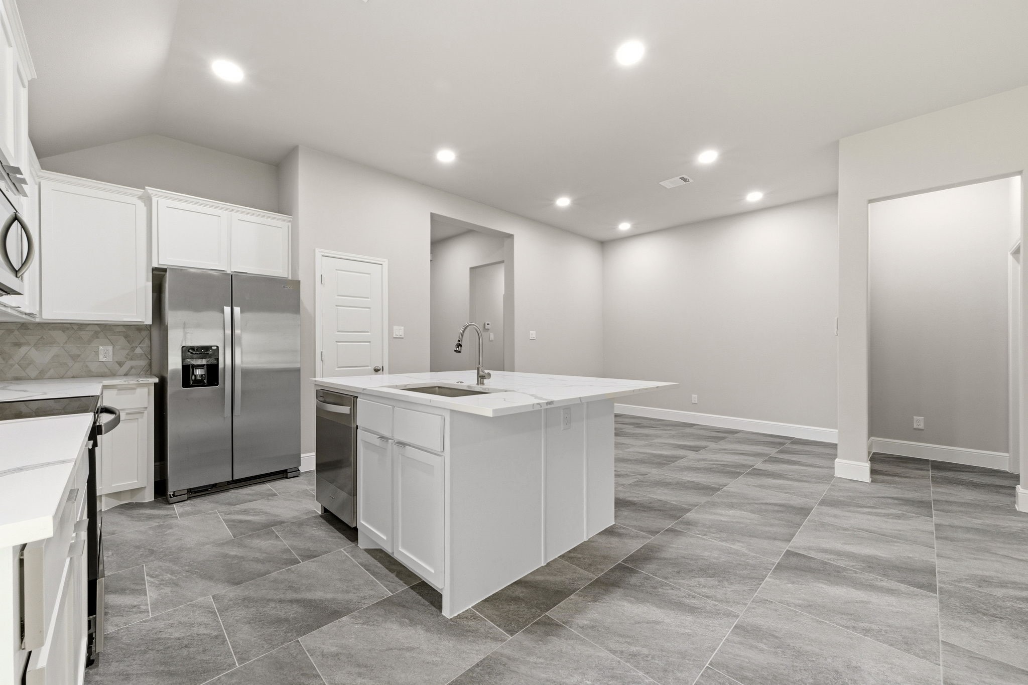 23620 Youpon Lane Spring, TX 77389 - Photo 11 of 37 Oversized sink, recessed lighting, stainless steel energy efficient appliances