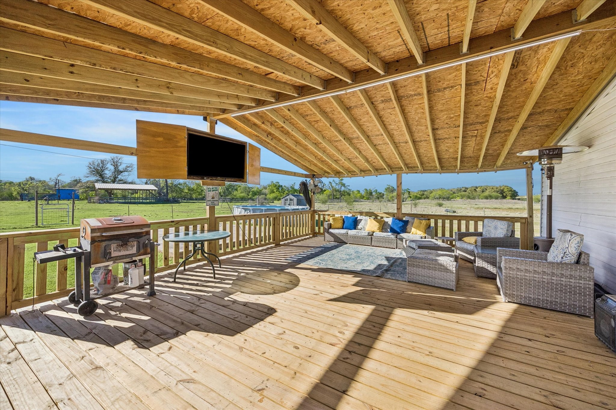 41230 Delma Road Hempstead, TX 77445 - Photo 18 of 23 Large covered deck with built-in big screen TV.