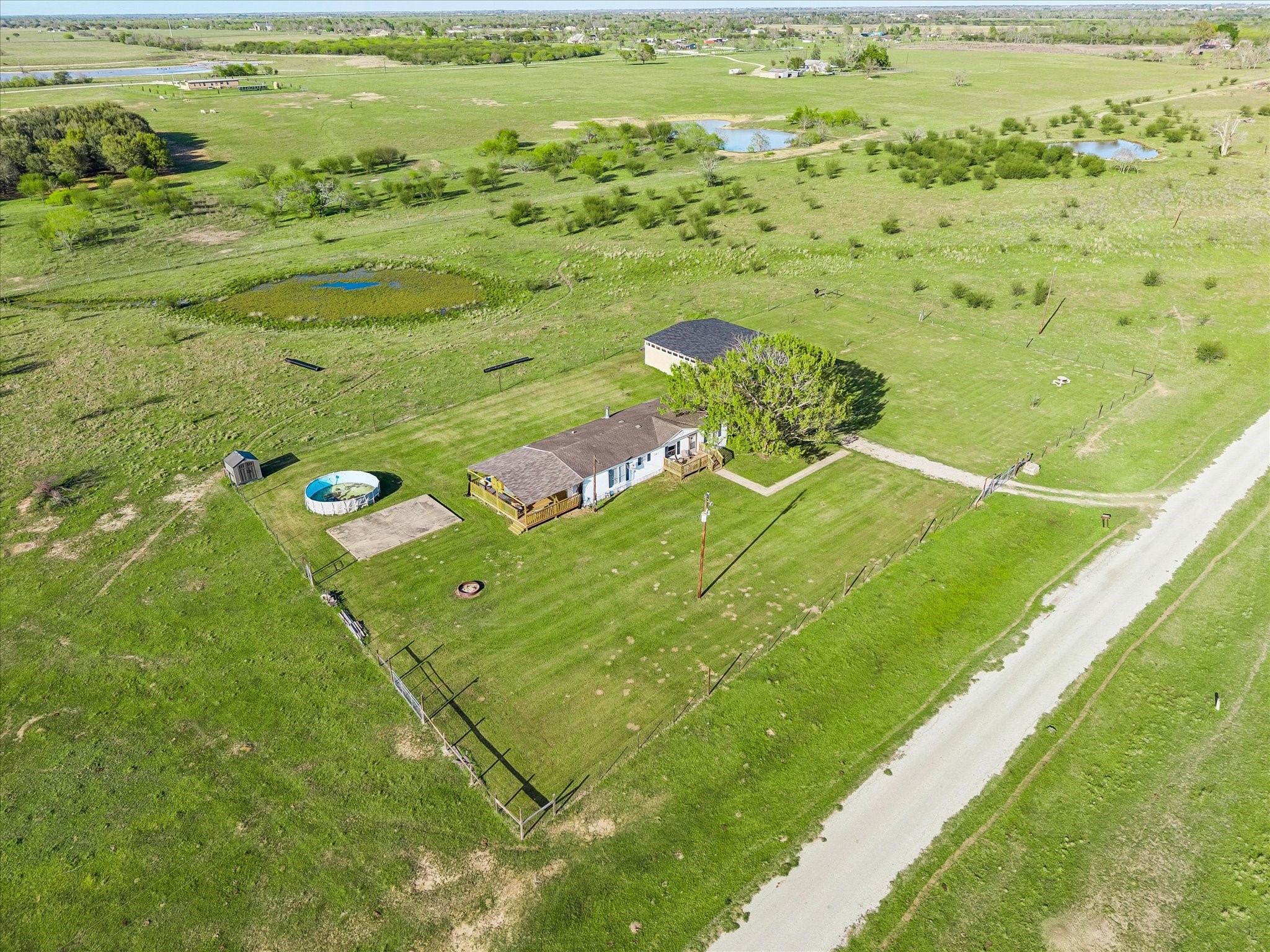 41230 Delma Road Hempstead, TX 77445 - Photo 23 of 23 View of front of property from Delma Rd. Above ground pool is not working and will be removed from property prior to closing.