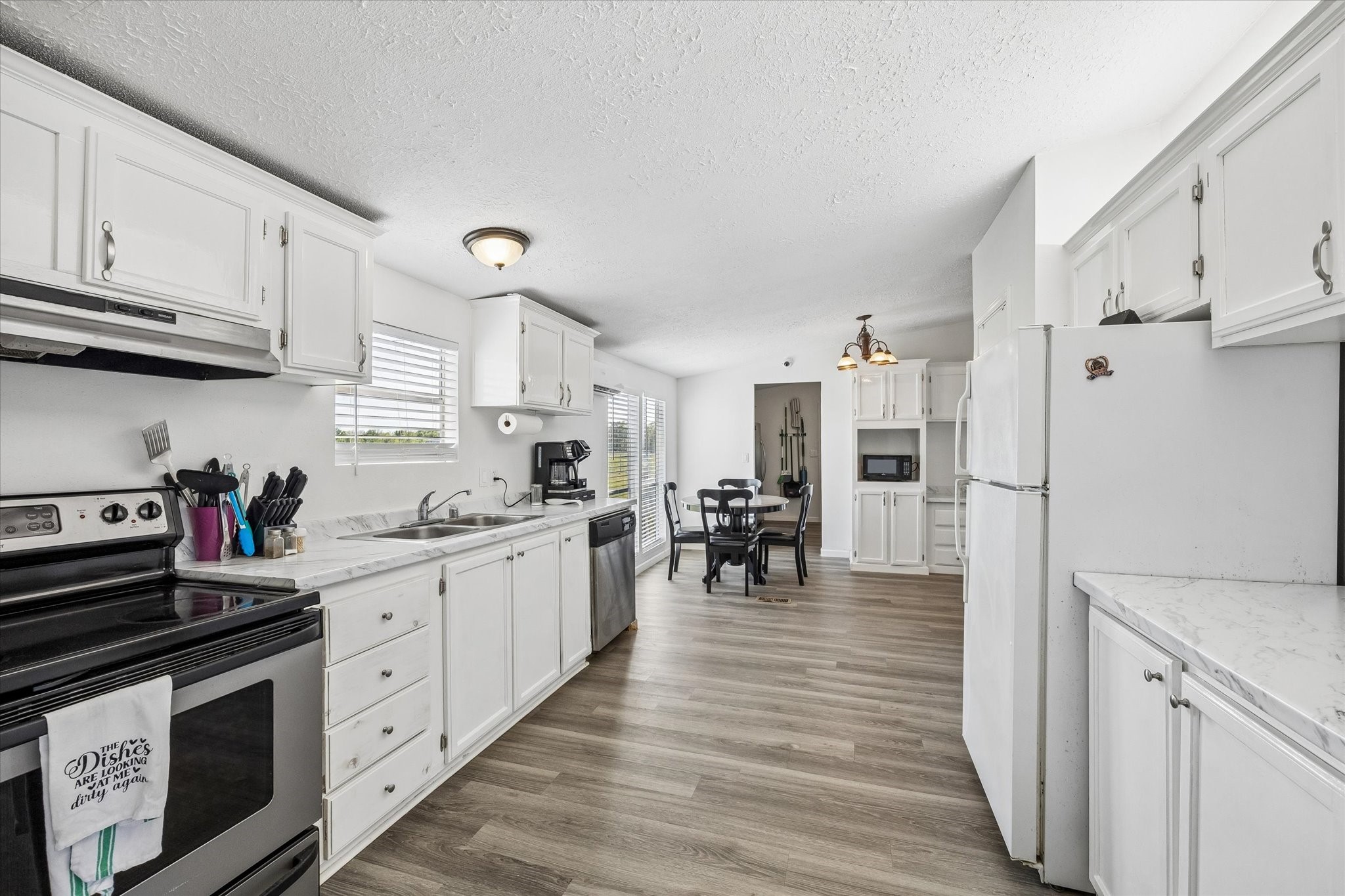 41230 Delma Road Hempstead, TX 77445 - Photo 9 of 23 Another view of kitchen and dining area.