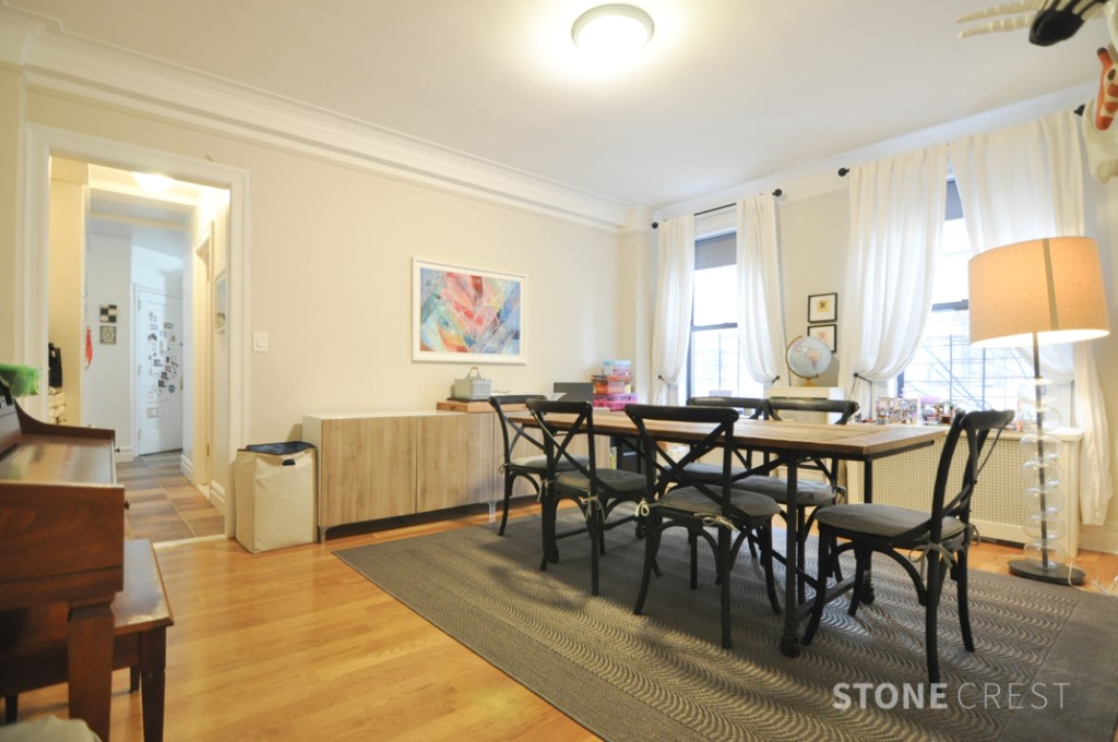 290 Riverside Drive, Unit 2B Manhattan, NY 10025 - Photo 3 of 17 a view of a dining room with furniture and wooden floor