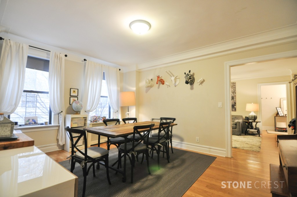 290 Riverside Drive, Unit 2B Manhattan, NY 10025 - Photo 4 of 17 a view of a dining room with furniture and wooden floor