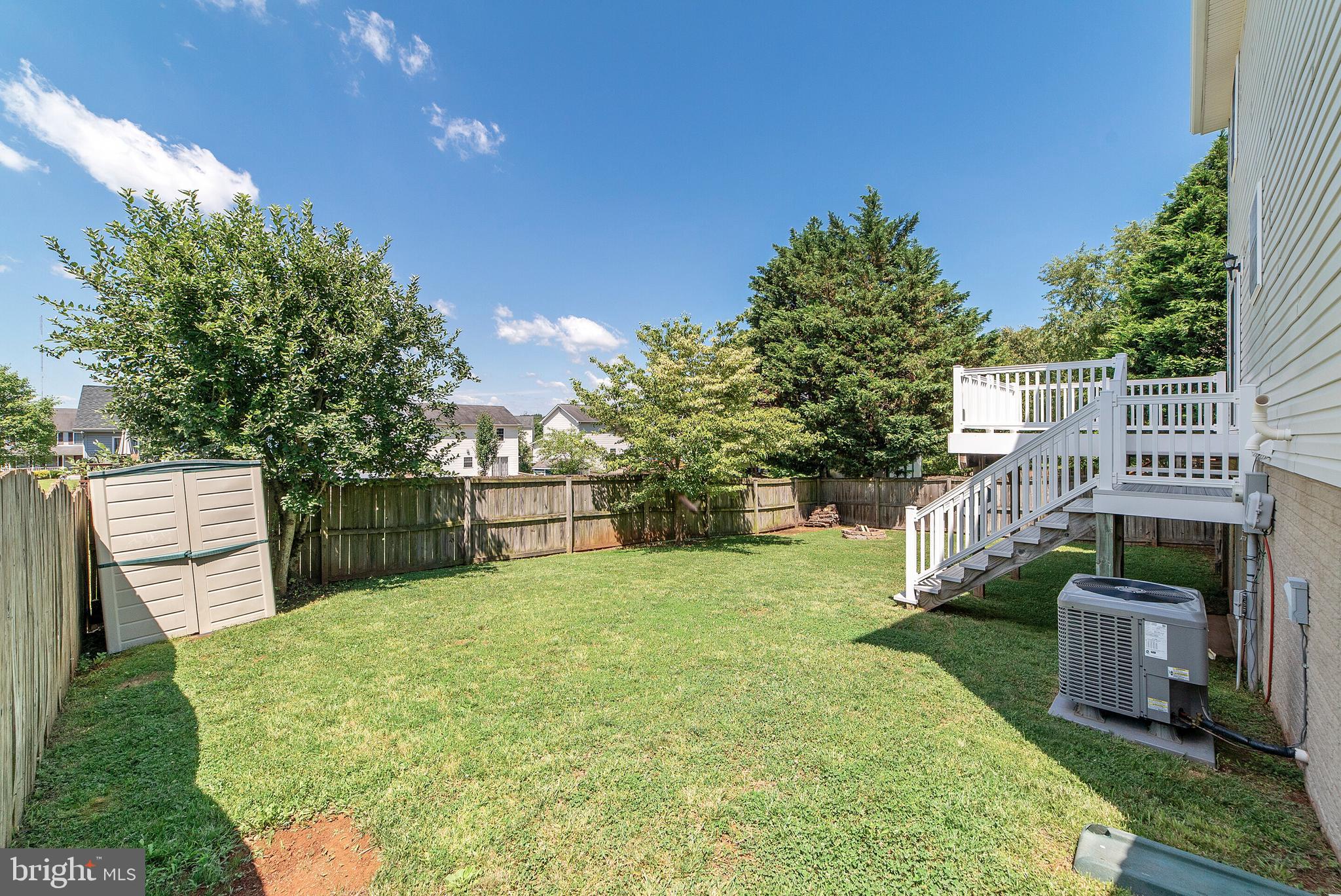 613 Clubhouse Way Culpeper, VA 22701 - Photo 18 of 20 Rear yard and shed conveys