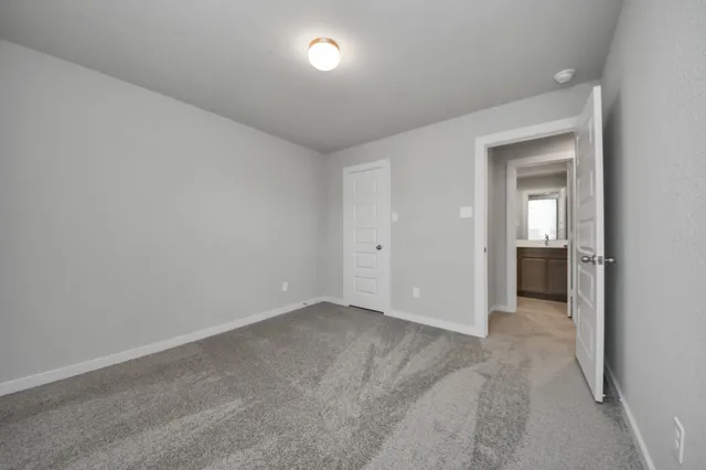 a view of a house with backyard and garden