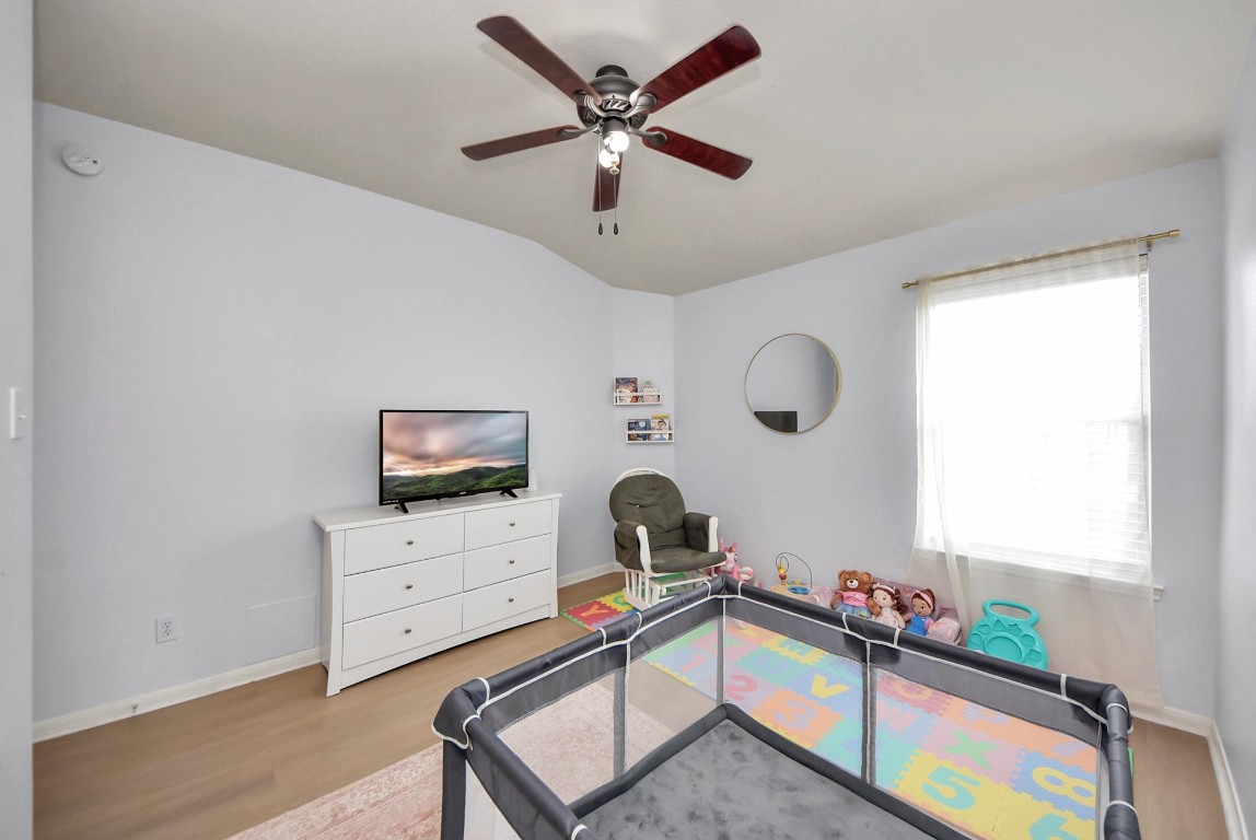 1054 Inverness Cove Dickinson, TX 77539 - Photo 24 of 28 a room with furniture and window