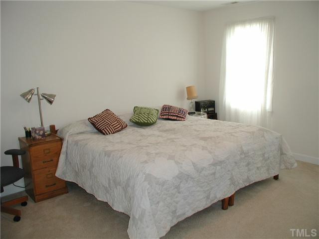 620 Sarah Lawrence Court Raleigh, NC 27609 - Photo 11 of 19 Oversized bedroom 3 on second floor (14'x13.8') Bedroom