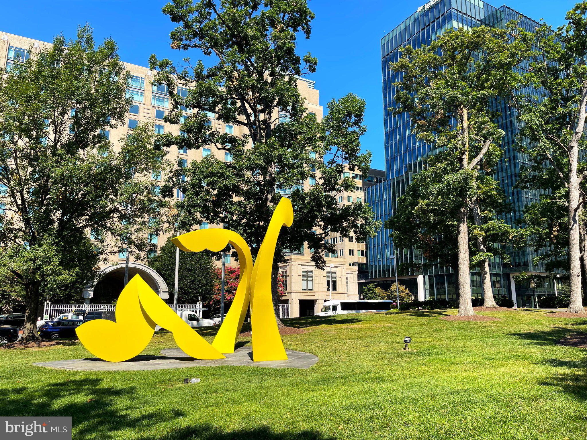 11081 Pelham Manor Place Reston, VA 20194 - Photo 85 of 99 Vibrant sculpture amidst urban greenery.