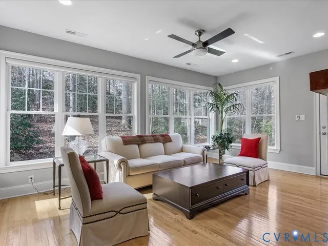 a kitchen with stainless steel appliances granite countertop a stove refrigerator and microwave