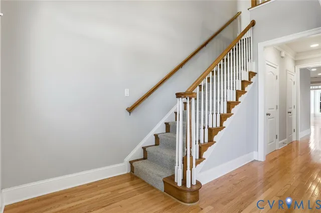 an aerial view of a house with a swimming pool