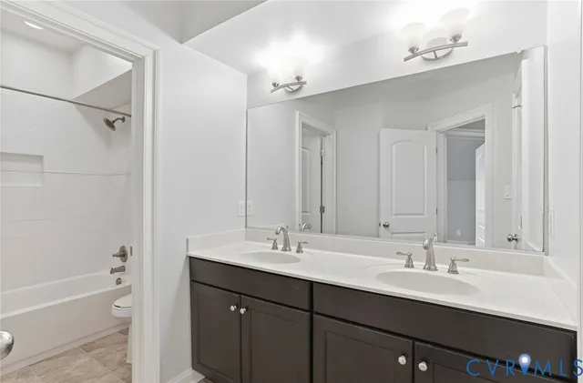 front view of a building with a garden