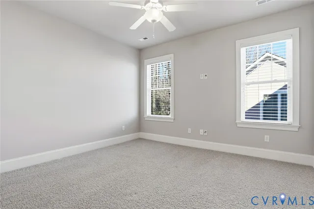 an aerial view of a house with outdoor space