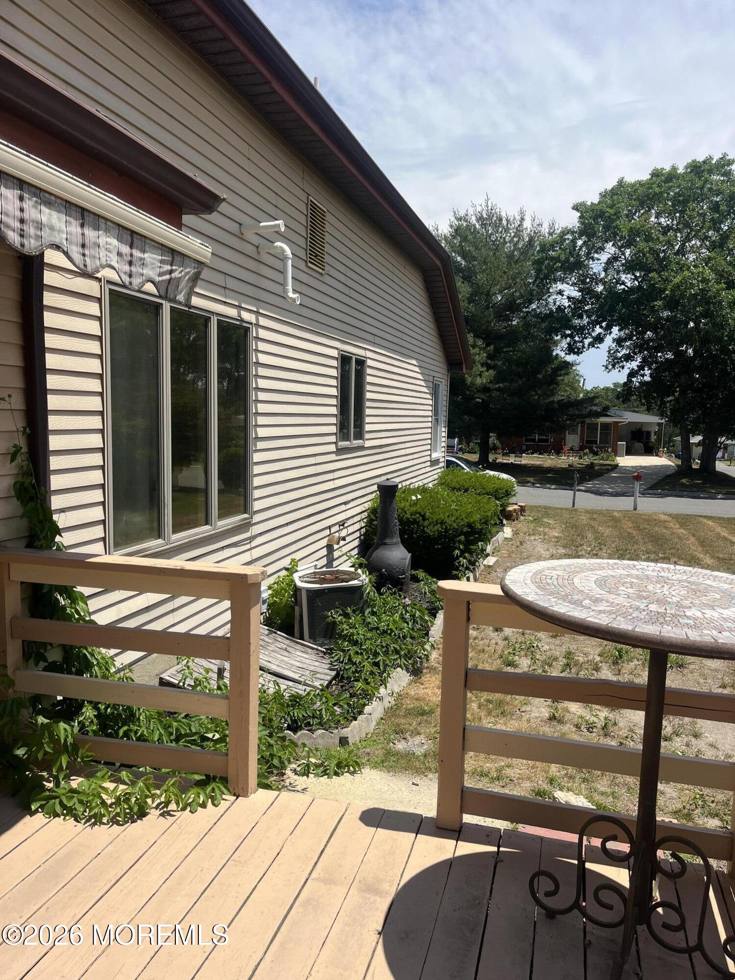 40 Sycamore Access Road, Unit 40 Manahawkin, NJ 08050 - Photo 16 of 27 Deck + Sideyard
