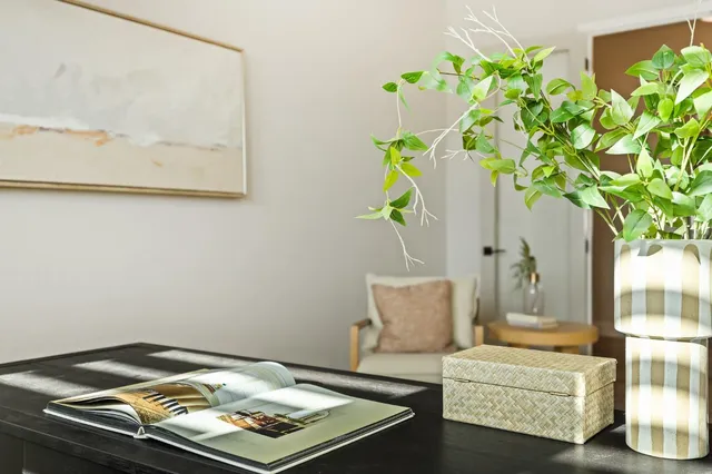 a spacious bathroom with a double vanity sink a large mirror a shower and a bathtub