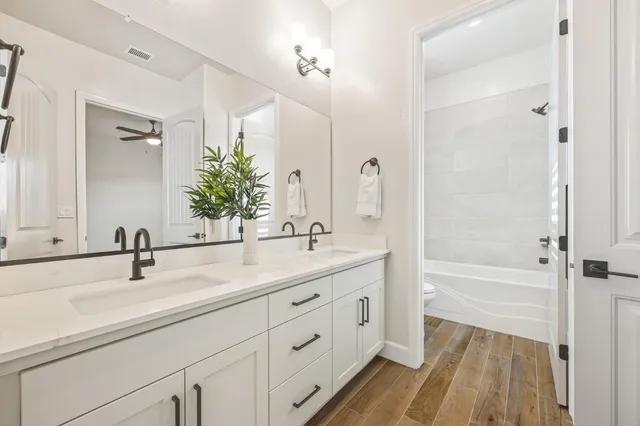 a bathroom with a shower and a toilet